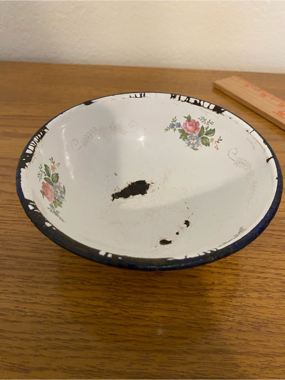White Floral Enamel Bowl wear and tear
